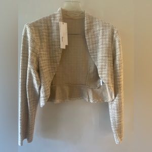 Great color jacket. This will fit a dress sizes 10 or 12. Never worn.